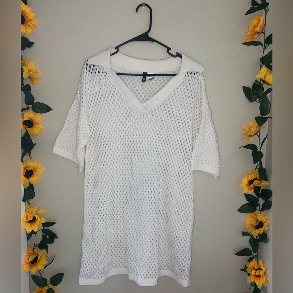 H&M dress with circle cut outs and collar.